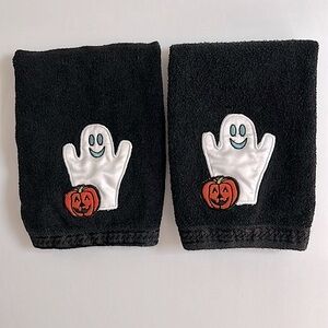 Halloween hand towels with a friendly ghost and pumpkin appliqué